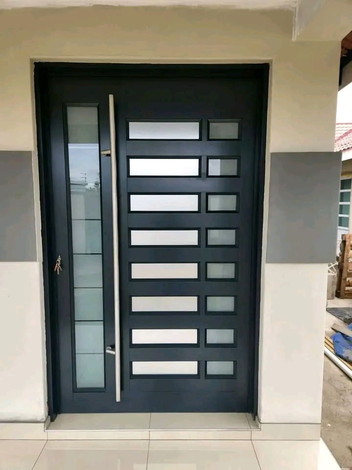Charcoal pivot entrance door