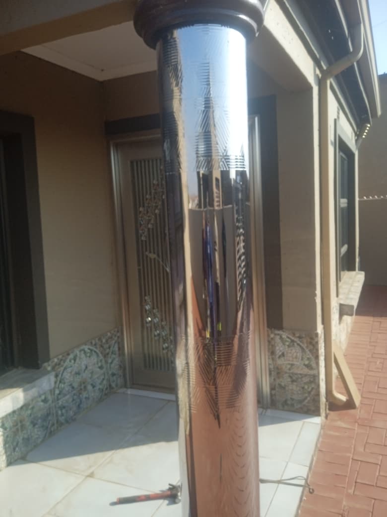 Polished stainless steel column cladding